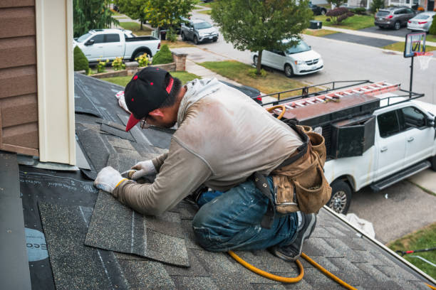 Professional Roofing technician working in Pennville, PA